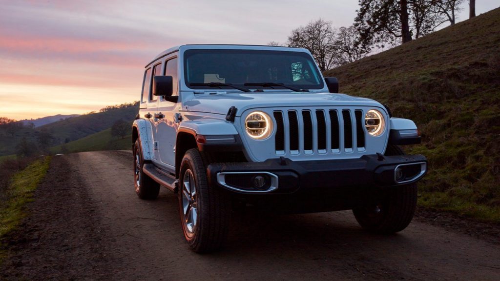 Sunset over the Jeep Wrangler on a trail