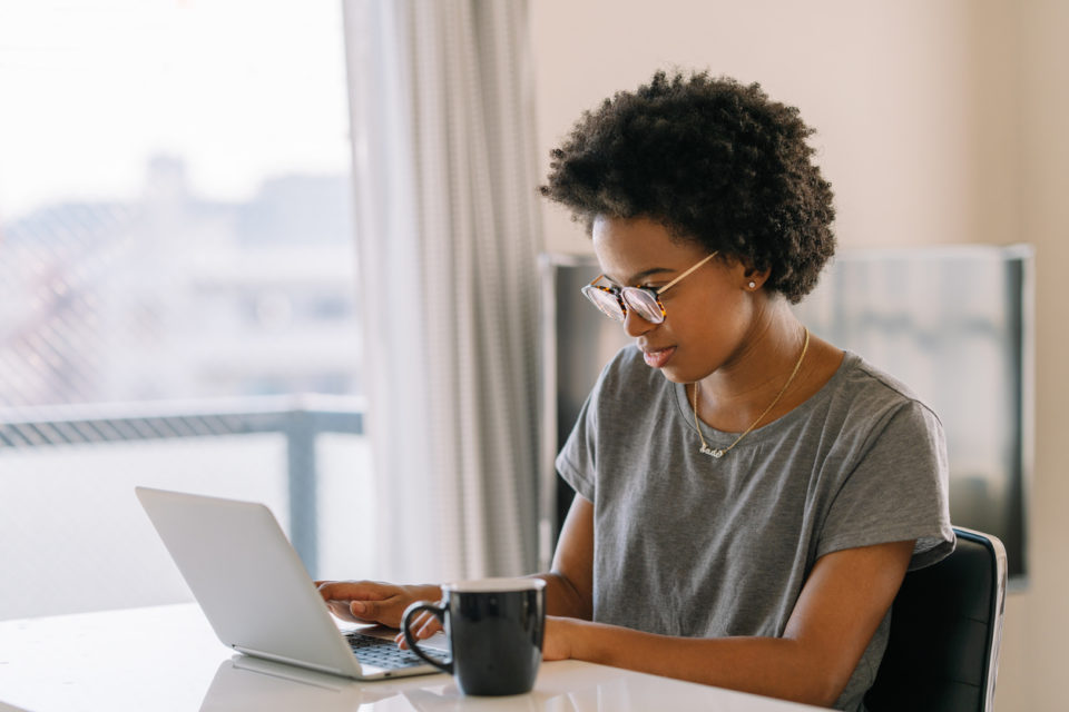 Woman online shopping at home.