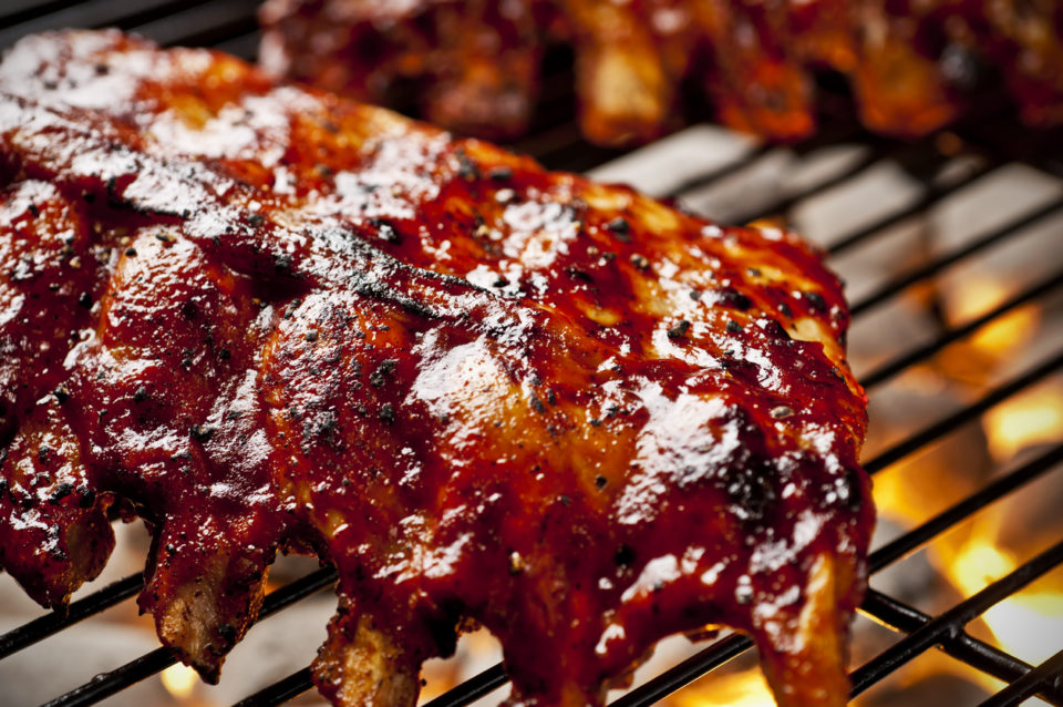 Barbecue ribs cooking on the grill