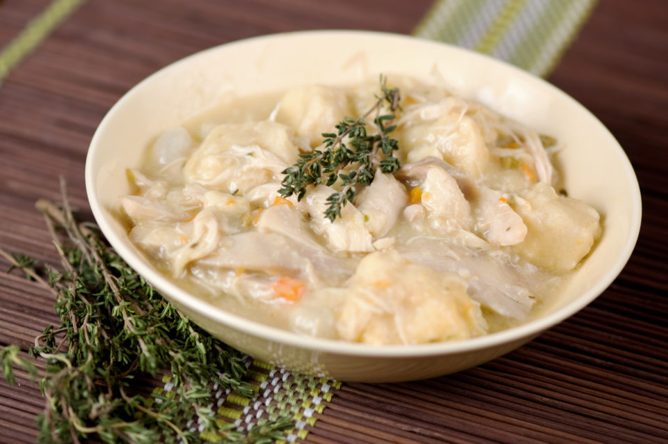 A bowl of chicken and dumplings