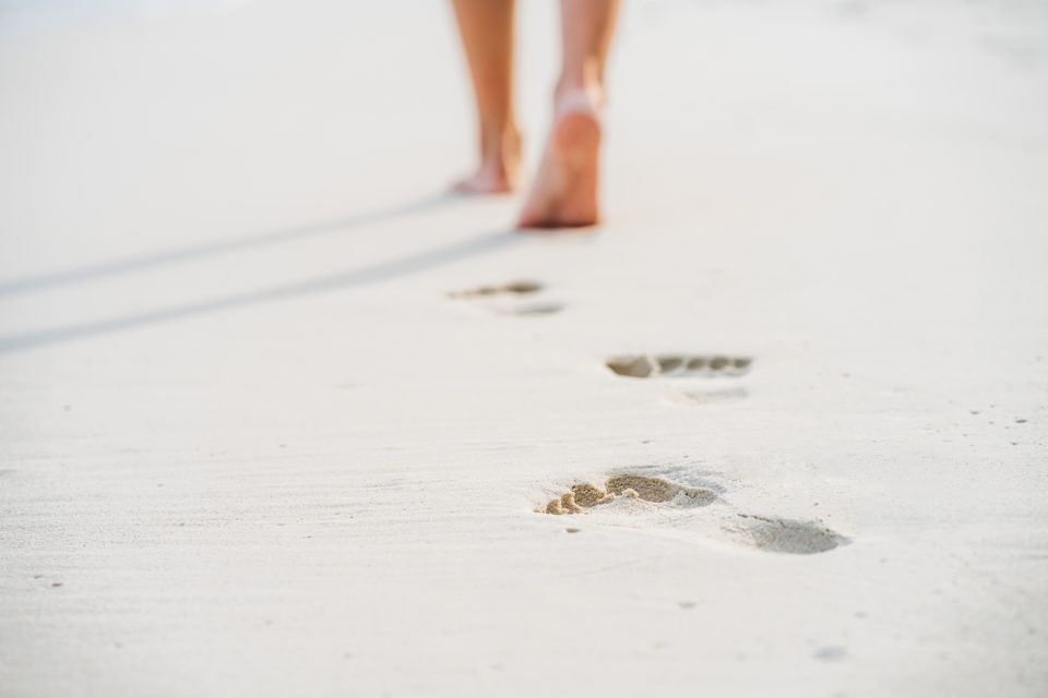 Walking barefoot in sand