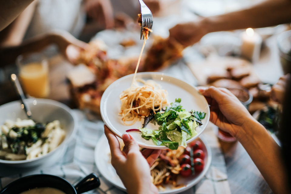 sharing food at a restaurant