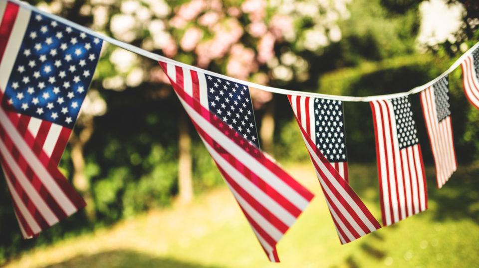 American Flags hung on a banner for the Fourth of July