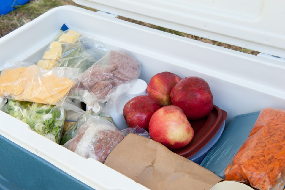 Cooler filled with food for a camping trip.