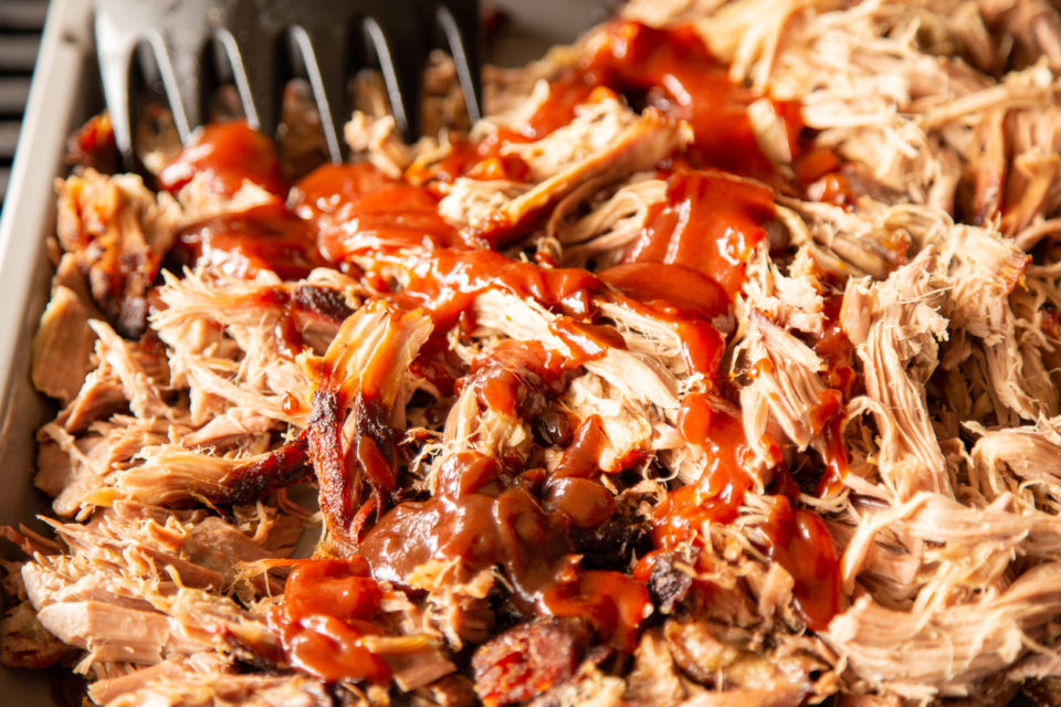 Pulled pork with drizzled BBQ sauce